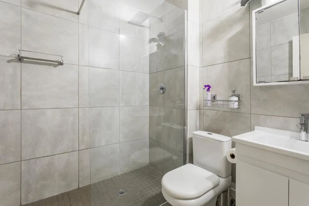 Bathroom with a walk in glass shower at Ocean Pearl